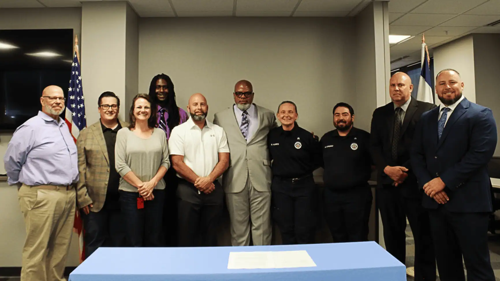 CDOC management and the COWINS bargaining team and leadership at the ceremony to sign the new DOC contract.